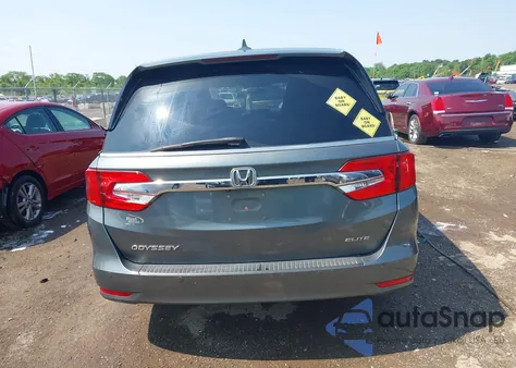 2019 Honda Odyssey Elite z USA, uszkodzony, nr VIN 5FNRL6H97KB094676